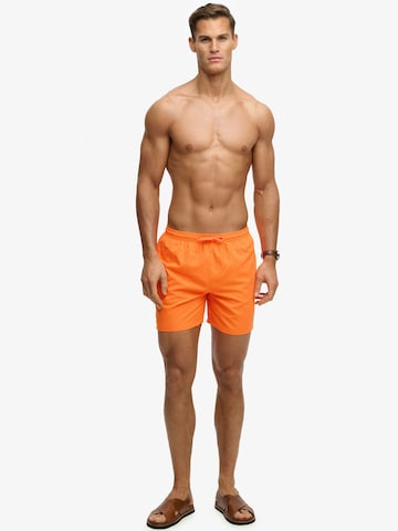 Superdry & Co Rövid fürdőnadrágok 'ESSENTIAL' - narancs