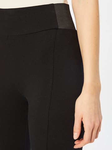 Skinny Pantalon 'Albany' ABOUT YOU en noir