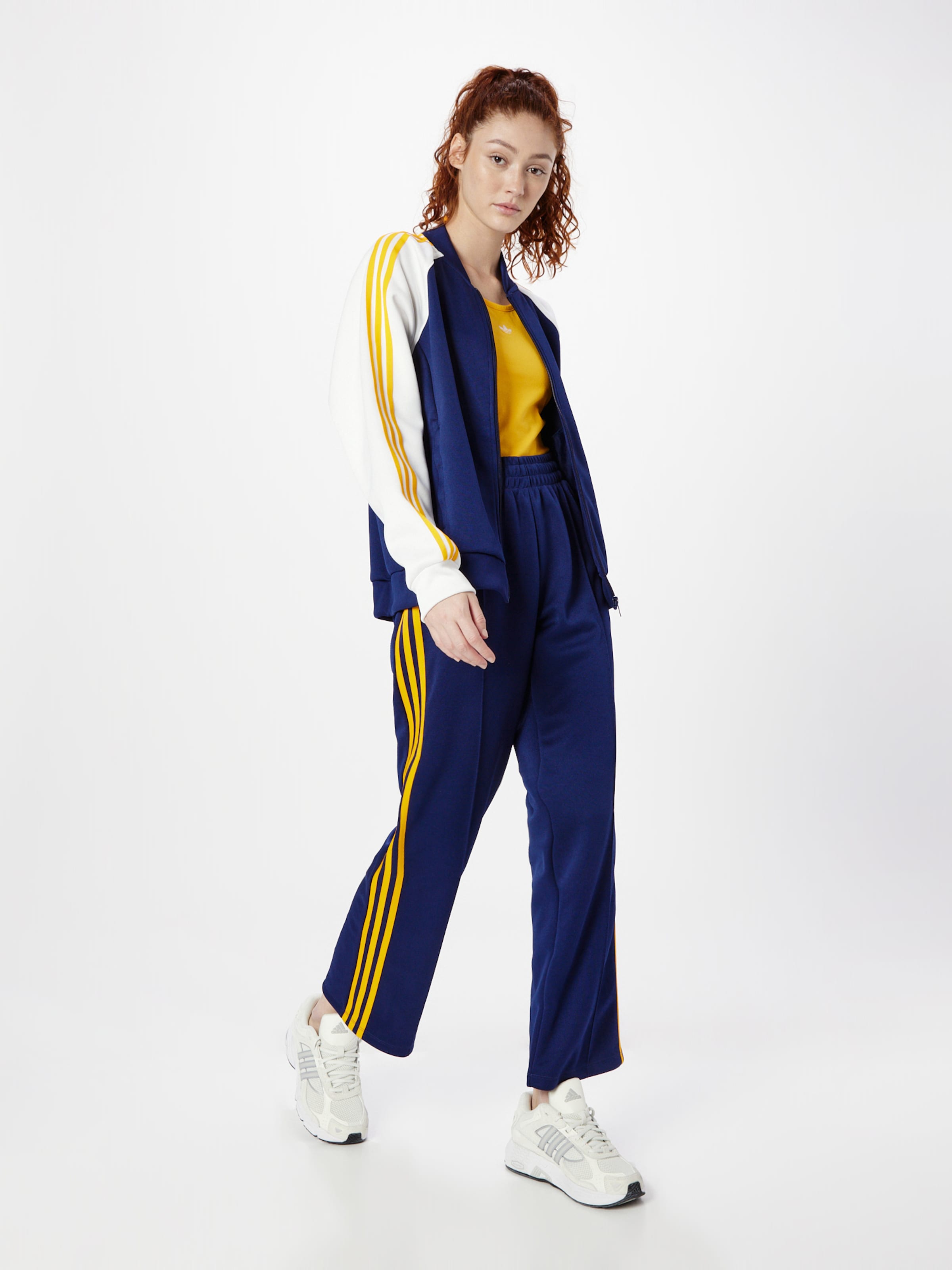 Adidas originals adicolor superstar track pants yellow sale