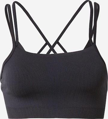 Sutien sport de la NIKE pe negru: față