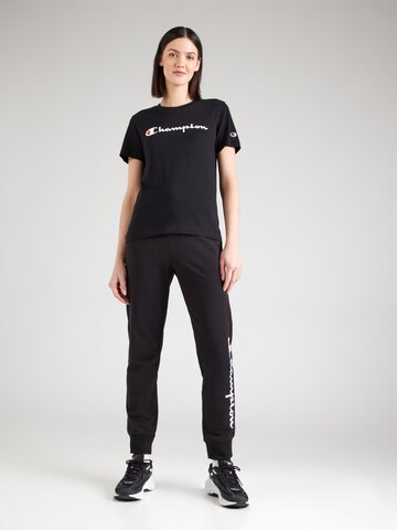Maglietta di Champion Authentic Athletic Apparel in nero