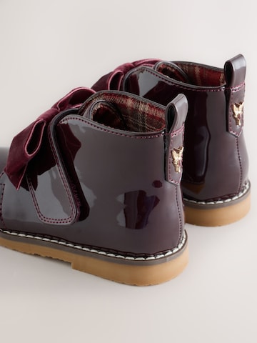 Next - Botas en rojo