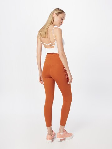 NIKE Skinny Sportovní kalhoty – oranžová