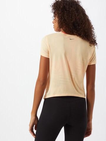 Maglia funzionale di NIKE in arancione