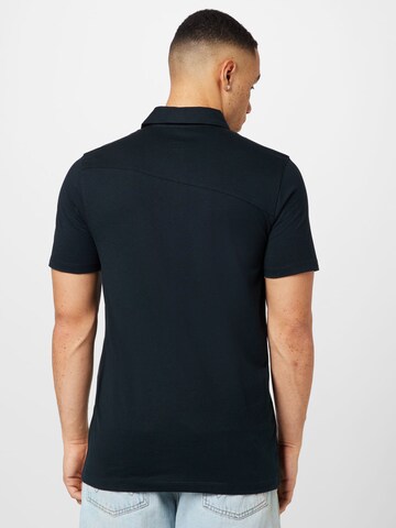 Volcom Poloshirt 'WOWZER' in Schwarz