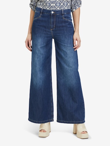 Cartoon Tapered Jeans in Blue: front