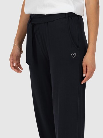 Tapered Pantaloni 'Alice' di Alife and Kickin in nero