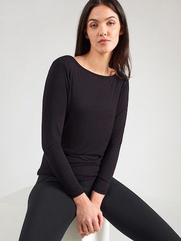 CURARE Yogawear Funkční tričko – černá: přední strana