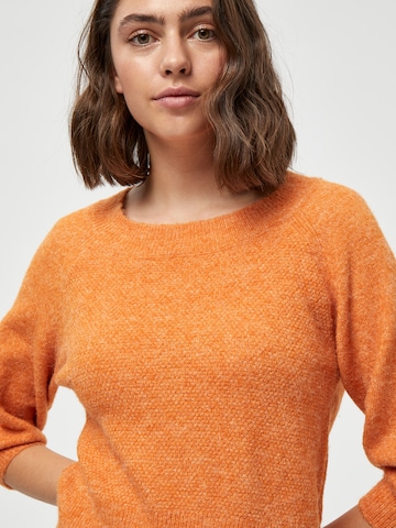 Pull-over 'Flores' Peppercorn en orange