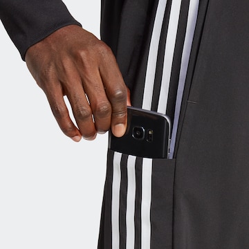 Effilé Pantalon de sport 'Essentials' ADIDAS SPORTSWEAR en noir