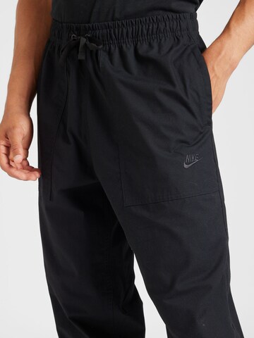 Loosefit Pantaloni 'CLUB BARCELONA' di Nike Sportswear in nero