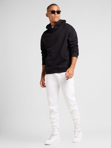 Nike Sportswear - Tapered Pantalón 'Tech Fleece' en gris