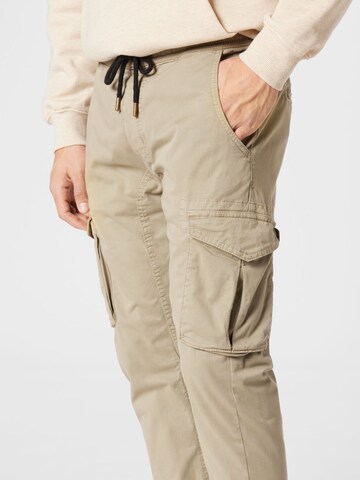 ALPHA INDUSTRIES Tapered Cargobroek in Beige