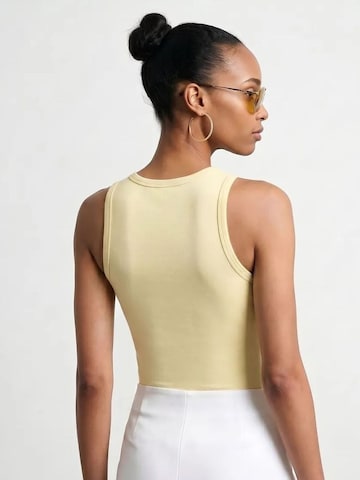 Top di Dilvin in giallo
