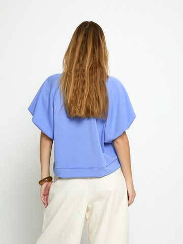 Peppercorn Toppi 'Minnie' värissä sininen