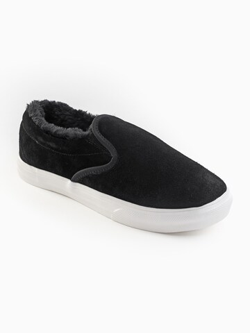 Slip on 'Wilder' Minnetonka en noir