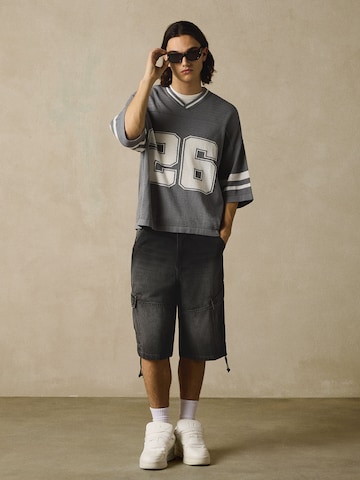 Bershka Baggy Cargo jeans in Black