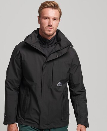 Superdry Outdoorjas 'Snow Ultra' in Zwart: voorkant