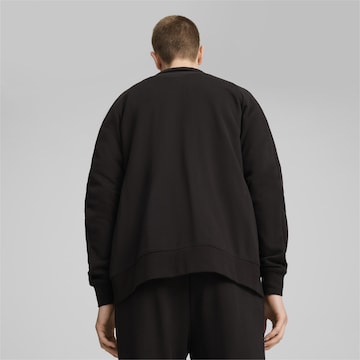 PUMA Trainingsjacke 'T7' in Schwarz