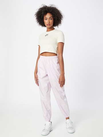 Nike Sportswear Tapered Pants in Pink