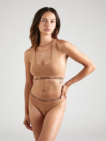 Calvin Klein Underwear Tanga – béžová