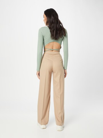 Wide leg Pantaloni cu dungă de la 24COLOURS pe bej