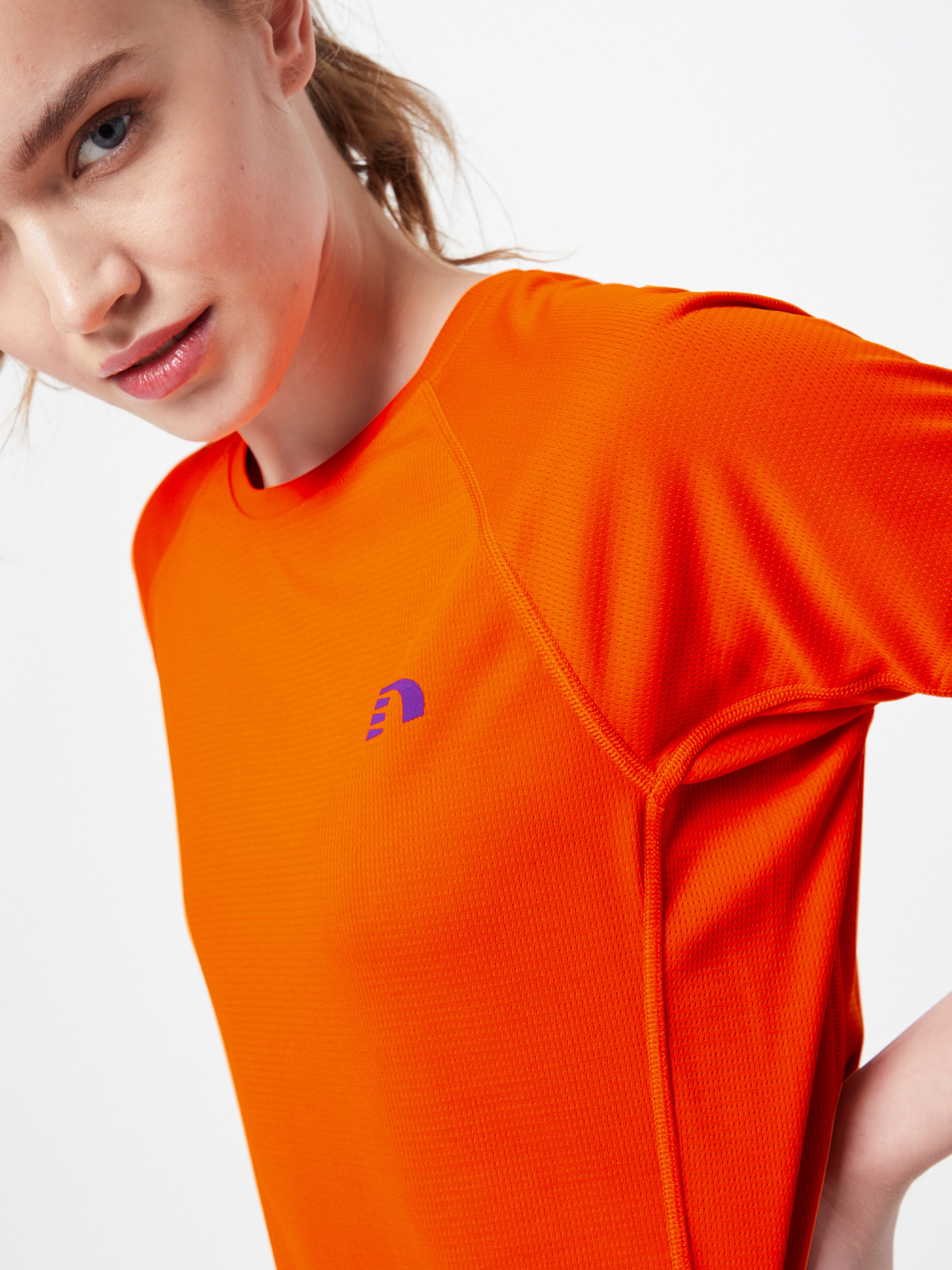 Disciplines sportives T-shirt fonctionnel Newline en Orange Foncé 