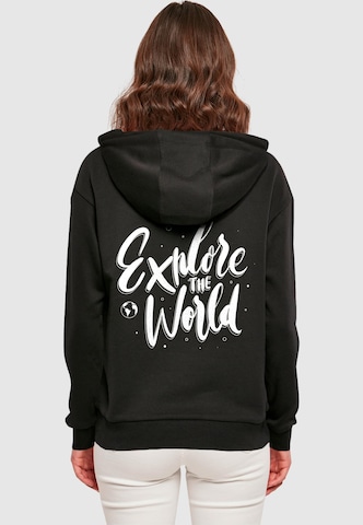 Merchcode Sweatshirt 'Explore The World Everyday' in Schwarz