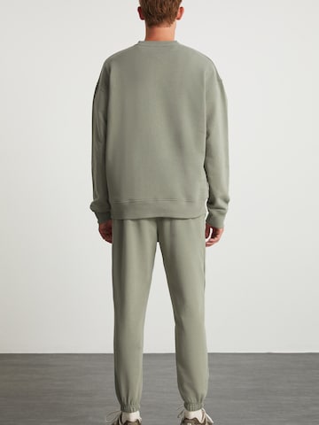 Grimelange Облекло за бягане в зелено