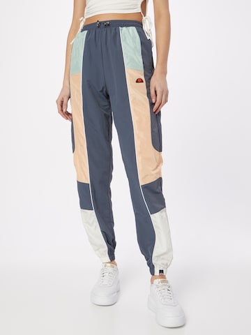 ELLESSE Tapered Pants in Blue: front