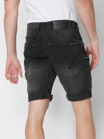 Coupe slim Jeans cargo KOROSHI en noir