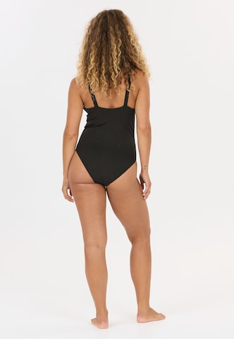 Athlecia Badeanzug 'Florita' in Schwarz