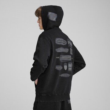 PUMA Sportsweatshirt 'Scuderia Ferrari Desert Sun' in Schwarz