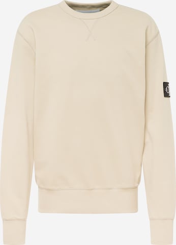 Sweat-shirt Calvin Klein Jeans en beige : devant