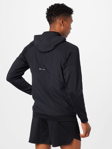 Veste de sport ADIDAS SPORTSWEAR en noir