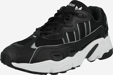 ADIDAS ORIGINALS - Zapatillas deportivas bajas 'OZWEEGO' en negro: frente