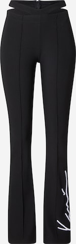 Karl Kani Flared Pants in Black: front