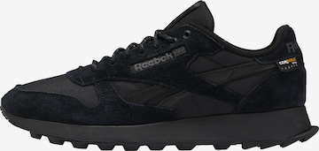 Reebok Sneakers in Black: front