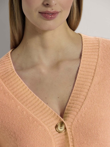 MADELEINE Gebreid vest in Oranje