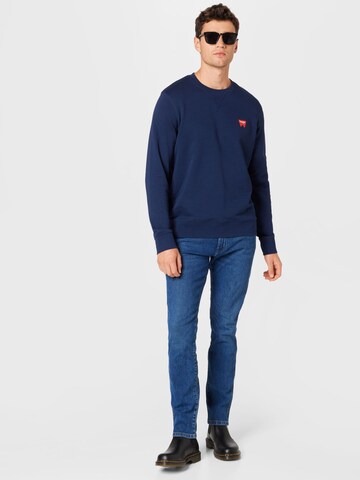 WRANGLER Sweatshirt 'Sign off' in Blauw