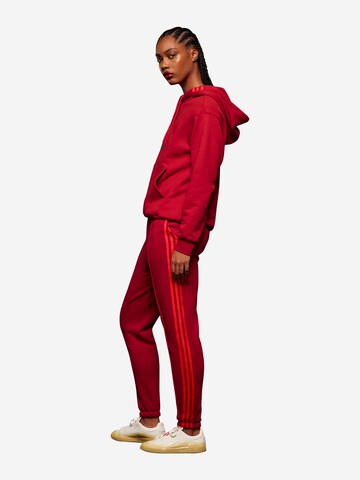 ADIDAS ORIGINALS Tapered Trousers 'IVP' in Red: front