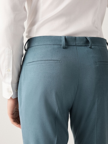 Slimfit Pantaloni chino 'Motionflex' di Next in blu