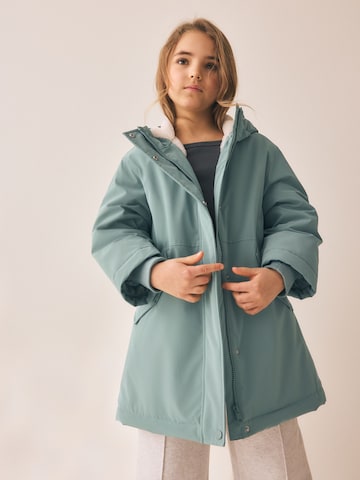 Next - Abrigo en verde: frente