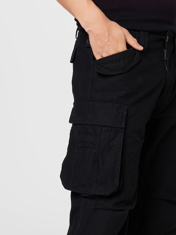 Regular Pantaloni cu buzunare de la Brandit pe negru