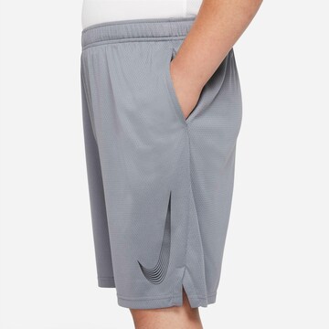 NIKE Regular Workout Pants in Grey