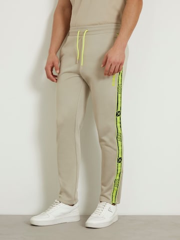 GUESS Regular Workout Pants in Beige: front