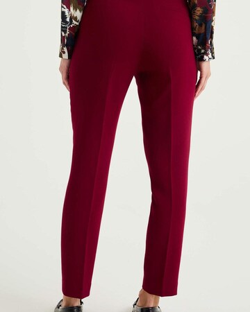 WE Fashion Slim fit Trousers with creases in Red