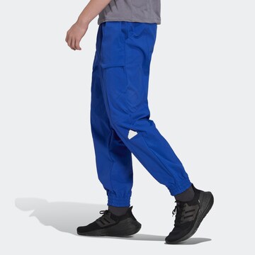 ADIDAS SPORTSWEAR Tapered Sportbroek in Blauw