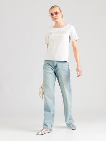 Tricou de la monari pe bej