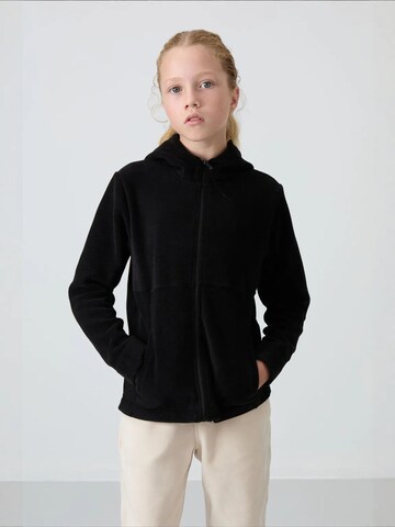 Tommy Life Dressipluus 'TOMMY Unisex-Kapuzen-Sweatshirt Für Jugendliche Mit Reißverschluss', värv must